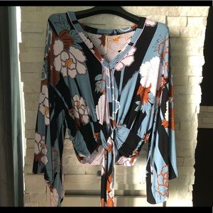 Free People bell sleeved 3/4 length top.